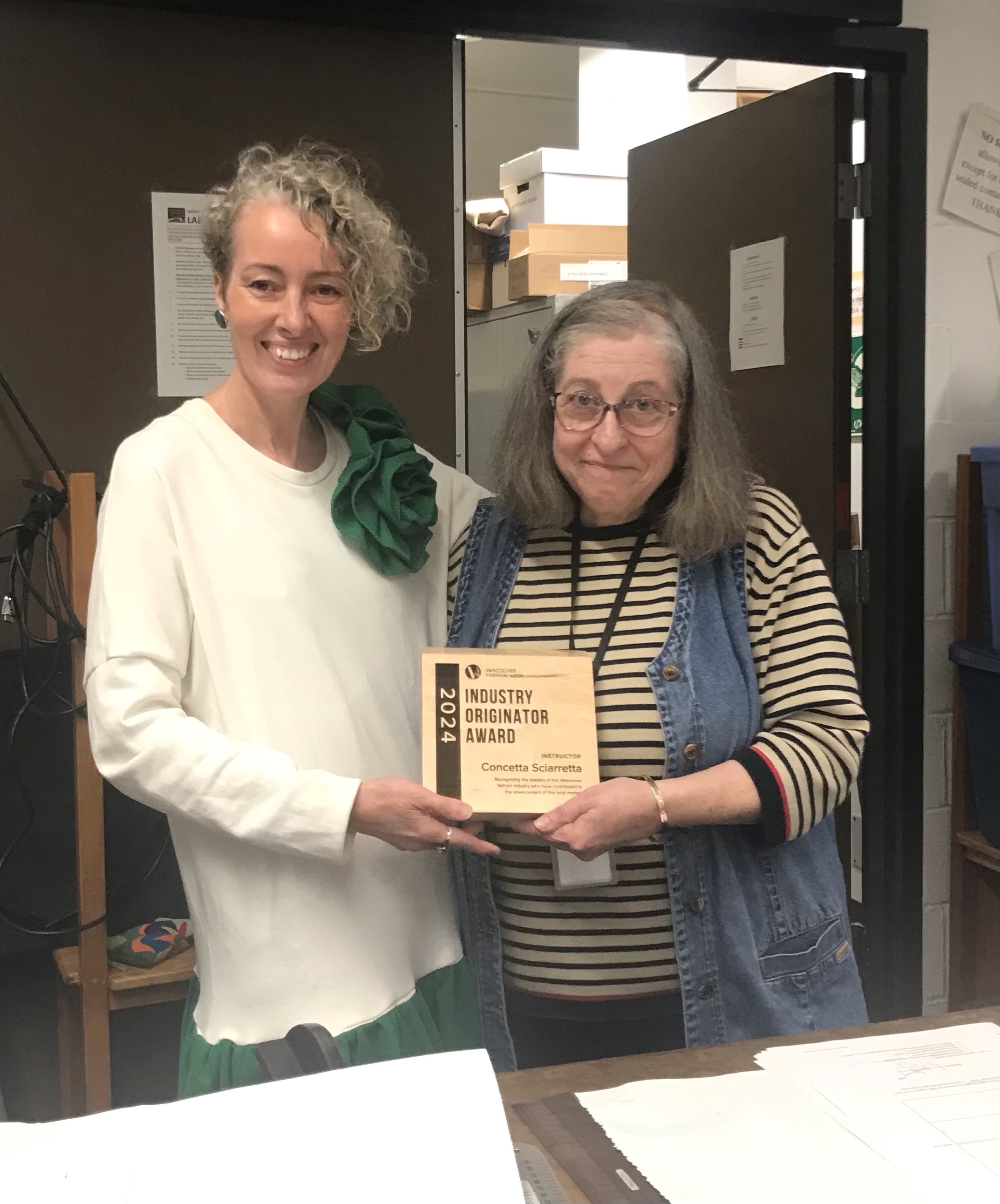 Instructor Concetta Sciarretta (right) receives award from VCC Program Coordinator Sarah Murray